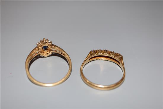 A modern 18ct gold, sapphire and diamond cluster ring and an 18ct and five stone ring, sizes Q/R & R/S, gross 6.8 grams.